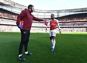Arsenal V Southampton 2018-19 Prints: Alexandre Lacazette's Water Break with Chris Morgan: Arsenal vs Southampton