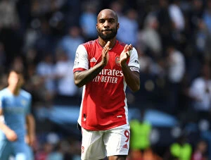 Images Dated 28th August 2021: Alexis Lacazette Applauds Arsenal Fans After Manchester City Showdown (2021-22)