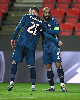 Alexis Lacazette and Calum Chambers: Celebrating Arsenal's Europa League Victory over Slavia Prague in an Empty Eden Arena (April 2021)