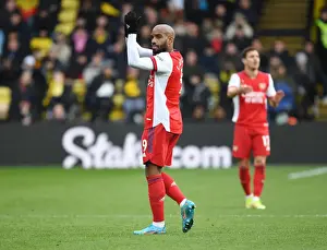 Alexis Lacazette Celebrates with Arsenal Fans: Arsenal's Triumph at Watford, Premier League 2021-22