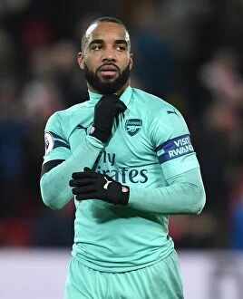 Images Dated 29th December 2018: Alexis Lacazette Salutes Arsenal Fans: Liverpool vs Arsenal (2018-19)
