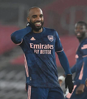 Images Dated 26th January 2021: Alexis Lacazette's Hat-Trick: Arsenal's 3-0 Victory Over Southampton Amidst Empty St