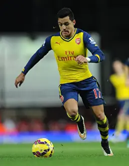 West Ham United V Arsenal 2014-15 Prints: Alexis Sanchez in Action: Arsenal's Star Performance against West Ham United