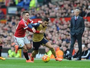 Images Dated 28th February 2016: Alexis Sanchez (Arsenal) Guillermo Varela (Man Utd). Manchester United 3: 2 Arsenal