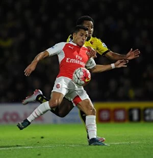 Watford v Arsenal 2015/16 Collection: Alexis Sanchez (Arsenal) Ikechi Anya (Watford)