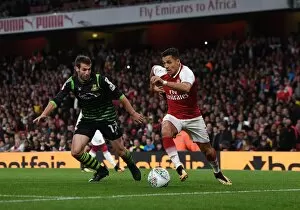 Arsenal v Doncaster Rovers - Carabao Cup 2017-18 Collection: Alexis Sanchez (Arsenal) Matty Blair (Doncaster). Arsenal 1: 0 Doncaster. The Carabao Cup