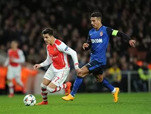 Images Dated 25th February 2015: Alexis Sanchez (Arsenal) Nabil Dirar (Monaco). Arsenal 1: 3 AS Monaco. UEFA Champions League