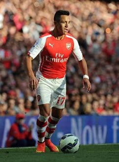 Images Dated 16th August 2014: Alexis Sanchez: Arsenal's Dynamic Force in Action against Crystal Palace, Premier League 2014/15