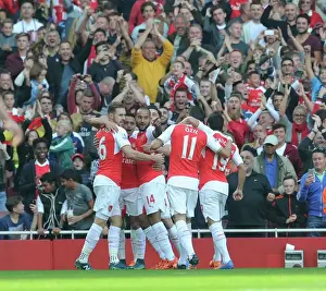 Alexis Sanchez celebrates scoring his 1st goal with his team mates