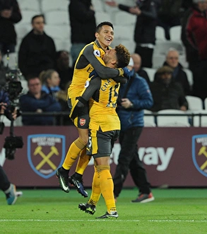 Alexis Sanchez celebrates scoring his 3rd goal, Arsenals 5th, with Alex Oxlade-Chamberlain Alexis Sanchez celebrates scoring his 3rd goal, Arsenals 5th, with Alex Oxlade-Chamberlain