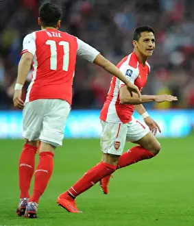 Alexis Sanchez celebrates scoring his and Arsenals 2nd goal. Arsenal 2: 1 Reading