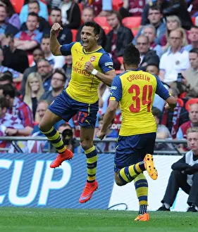 Arsenal V Aston Villa - FA Cup Final 2015 Prints: Alexis Sanchez celebrates scoring Arsenals 2nd goal. Arsenal 4: 0 Aston Villa