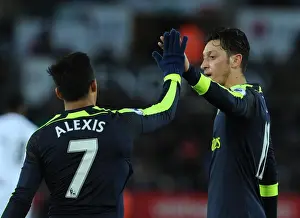 Alexis Sanchez celebrates scoring Arsenals 4th goal with Mesut Ozil. Swansea City 0