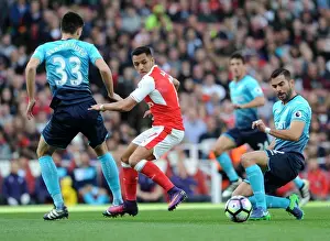 Arsenal V Swansea City 2016-17 Prints: Alexis Sanchez Faces Intense Scrutiny from Swansea Defenders during Arsenal's 2016-17 Premier League Clash