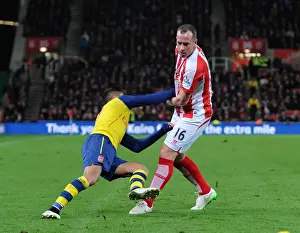 Stoke City V Arsenal 2014-15 Prints: Alexis Sanchez Foul by Charlie Adam during Arsenal vs Stoke City (2014-15)
