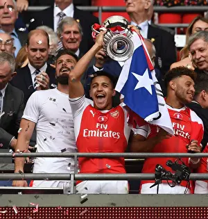 Arsenal V Chelsea - FA Cup Final 2017 Prints: Alexis Sanchez Lifts FA Cup: Arsenal Defeats Chelsea in 2017 Final