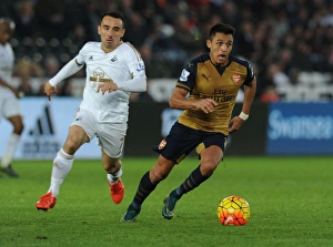 Swansea City V Arsenal 2015-16 Prints: Alexis Sanchez Outmaneuvers Leon Britton