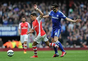 Arsenal V Chelsea 2014/15 Prints: Alexis Sanchez Outsmarts Cesc Fabregas: Intense Arsenal vs. Chelsea Clash