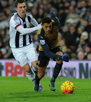 West Bromwich Albion V Arsenal 2015-16 Prints: Alexis Sanchez Outsmarts Craig Gardner: Arsenal's Star Forward Dazzles in West Bromwich Albion Clash