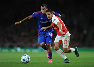 Arsenal V Olympiacos 2015/16 Prints: Alexis Sanchez Outsmarts Felipe Pardo: Arsenal's Masterclass in the 2015 Champions League Clash