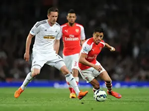 Arsenal Swansea City 2014/15 Prints: Alexis Sanchez Outsmarts Gylfi Sigurdsson: Arsenal vs Swansea, 2014/15 Premier League