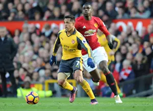 Manchester United V Arsenal 2016-17 Prints: Alexis Sanchez Outsmarts Pogba: A Premier League Battle - Arsenal vs