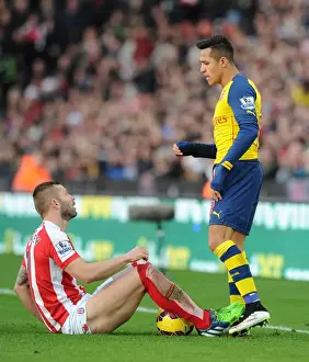 Stoke City V Arsenal 2014-15 Prints: Alexis Sanchez and Phil Bardsley Clash in Arsenal's Victory over Stoke City