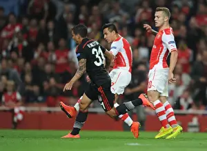 Arsenal V Besiktas 2014/15 Prints: Alexis Sanchez Scores Dramatic Goal Against Ramon Motta in Arsenal's UEFA Champions League Showdown with Besiktas
