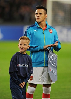 Alexis Sanchez and UEFA Mascot: Arsenal's Pre-Match Moment at Anderlecht's Constant Vanden Stock Stadium (2014-15 Champions League)
