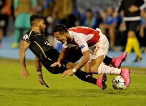 Dinamo Zagreb v Arsenal 2015-16 Collection: Alexis Sanchez vs El Arabi Hilal Soudani: Foul in Dinamo Zagreb vs Arsenal UEFA Champions League