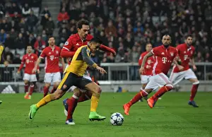 Bayern Munich V Arsenal 2016-17 Prints: Alexis Sanchez vs. Mats Hummels: Battle in the UEFA Champions League - Arsenal vs