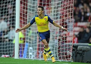 Images Dated 25th October 2014: Alexis Sanchez's Brace: Arsenal's Triumph over Sunderland (2014/15)