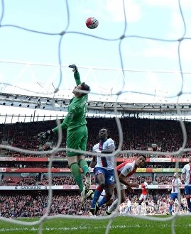 Images Dated 17th April 2016: Alexis Sanchez's Dramatic Header: Arsenal's Comeback Win Against Crystal Palace (Hennessey, Souare)
