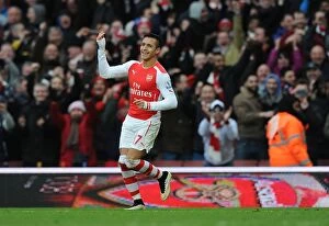 Images Dated 11th January 2015: Alexis Sanchez's Hat-Trick: Arsenal Crush Stoke City in Premier League Showdown
