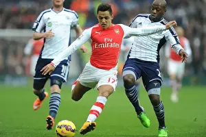 West Bromwich Albion V Arsenal 2014/15 Prints: Alexis Sanchez's Slick Moves: Arsenal's Victory Over West Bromwich Albion - Sanchez Outmaneuvers Mulumbu