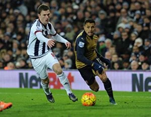West Bromwich Albion v Arsenal 2015-16 Collection: Alexis Sanchez's Thrilling Dash Past Craig Gardner: A Standout Moment from Arsenal's Victory over