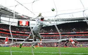 Arsenal V Liverpool 2014-15 Prints: Alexis Sanchez's Thrilling Goal: Arsenal Triumphs Over Liverpool in the Premier League 2014-15
