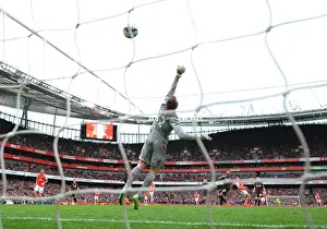 Arsenal V Liverpool 2014-15 Prints: Alexis Sanchez's Thrilling Goal: Arsenal's Triumph Over Liverpool in the 2014-15 Premier League