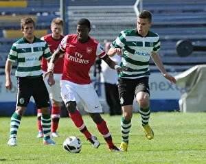 Images Dated 31st March 2013: Alfred Mugabo (Arsenal) Luka Stojanovic (Sporting). Arsenal U19 1: 3 Sporting Lisbon U19