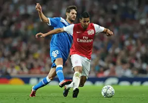 Arsenal V Olympiacos 2011-12 Prints: Andre Santos Outmaneuvers Djamel Abdoun: Arsenal FC vs Olympiacos FC