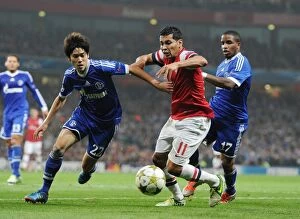 Images Dated 24th October 2012: Andre Santos vs. Atsuto Uchida and Jefferson Farfan: Arsenal's Battle in the Champions League