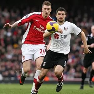 Andrej Arshavin (Arsenal) Aaron Hughes (Fulham)