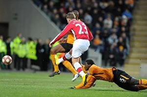 Images Dated 13th March 2010: Andrey Arsahvin shoots past Hull goalkeeper Boaz Myhill to score the 1st Arsenal goal