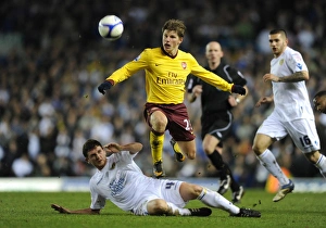 Leeds United v Arsenal FA Cup 2010-11 Collection: Andrey Arshavin (Arsenal) Alex Bruce (Leeds). Leeds United 1: 3 Arsenal