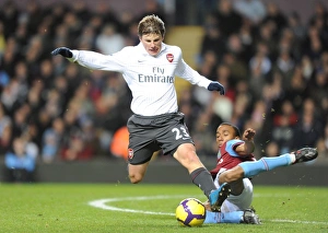 Aston Villa v Arsenal 2009-10 Gallery: Andrey Arshavin (Arsenal) Fabian Delph (Villa). Aston Villa 0: 0 Arsenal