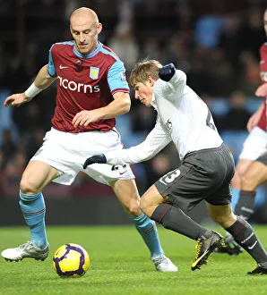 Aston Villa v Arsenal 2009-10 Gallery: Andrey Arshavin (Arsenal) James Collins (Villa). Aston Villa 0: 0 Arsenal