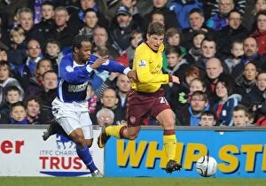 Images Dated 12th January 2011: Andrey Arshavin (Arsenal) Jamie Peters (Ipswich). Ipswich Town 1: 0 Arsenal