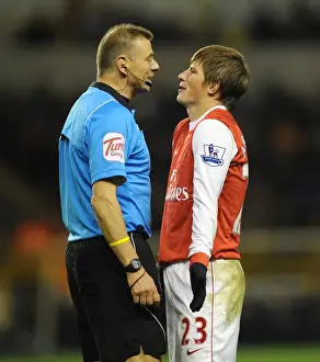 Wolverhampton Wanderers V Arsenal 2010-11 Prints: Andrey Arshavin (Arsenal) jokes with referee Mark Halsey. Wolverhampton Wanderers 0