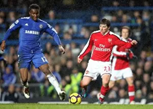 Chelsea v Arsenal 2009-2010 Collection: Andrey Arshavin (Arsenal) Jon Mikel Obi (Chelsea). Chelsea 2: 0 Arsenal