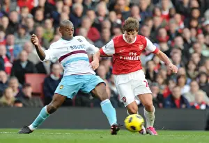 Arsenal V West Ham United 2010-11 Prints: Andrey Arshavin (Arsenal) Luis Boa Morte (West Ham). Arsenal 1: 0 West Ham United